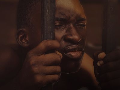Close up of a man hands gripping a horizontal bar